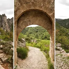 Sentier rocailleux menant à un village pittoresque, idéal pour une rando à Saint-Guilhem-le-Désert.