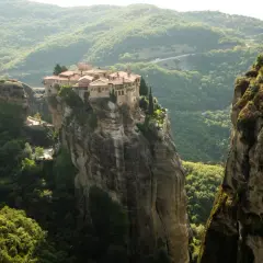 A breathtaking view of the Meteora monasteries perched atop towering rock formations, a must-see for any Greece meteora guide.