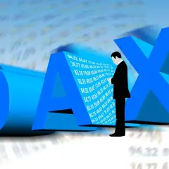 Biznesmen analizujący dax futures notowania. Trójwymiarowe litery DAX i wykresy giełdowe.