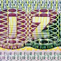 Fragment wizy z napisem "WIZA" i symbolami waluty. Wjazd do Armenii to marzenie wielu podróżników.
