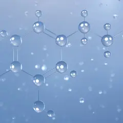Molekularna struktura, przypominająca łańcuchy tłuszczowe, jak w cetearyl alcohol, na błękitnym tle z kropelkami wody.