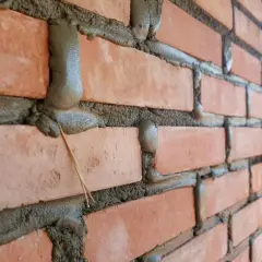 Jak długo schnie zaprawa cementowa? Czas schnięcia i czynniki wpływające