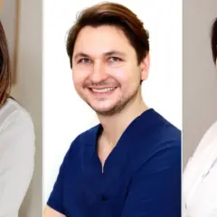 Trzy uśmiechnięte osoby: kobieta w białej koszuli, mężczyzna w granatowym mundurku, kobieta w białej bluzce.