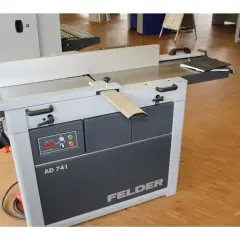 Détail de la dégauchisseuse FELDER AD 741, machine professionnelle pour le travail du bois.