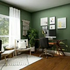 Nowoczesne biuro inspiracje: zielone ściany, drewniane biurko, wygodny fotel i sztuka na ścianach tworzą inspirującą przestrzeń do pracy.