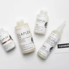 Zestaw produktów Olaplex: szampon, odżywka, kuracja i krem do stylizacji. Dowiedz się, olaplex co to za magia dla włosów.