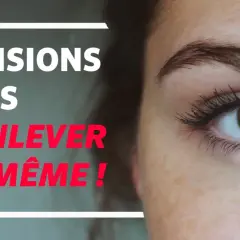Comment enlever des faux cils soi-même ! Gros plan sur un œil marron avec des extensions de cils.