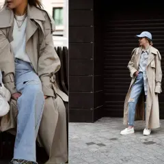 Jak się ładnie ubrać? Beżowy trencz, jasne jeansy z dziurami i białe sneakersy to stylowy zestaw na co dzień.