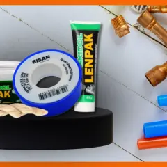 Materiały hydrauliczne: taśma teflonowa, pasta do gwintów Lenpak i mufa miedziana.