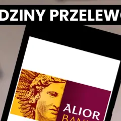 Telefon z aplikacją Alior Bank, na ekranie widoczny fragment logo i tekst "GODZINY PRZELEWÓW".