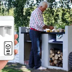 En man förbereder mat vid en murad grill vid en sjö. En telefon visar en 3D-modell av en Murad grill i AR.