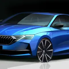 Niebieska Skoda Octavia w zbliżeniu, prezentująca nowy design przodu.