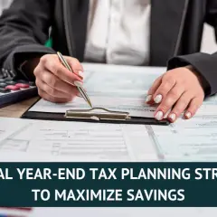 Hands reviewing tax forms with a calculator and laptop, emphasizing year-end tax planning for maximum savings.