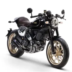 Ducati Scrambler Cafe Racer negra con asiento marrón, llantas doradas y el número 54 en un círculo blanco.