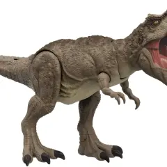 Zabawka T-Rex z otwartą paszczą i ostrymi zębami na białym tle.