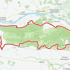 Mapa przedstawia przebieg kampinoskiego szlaku rowerowego, otaczającego zielony obszar Kampinoskiego Parku Narodowego, w pobliżu Wisły i miejscowości takich jak Zakroczym czy Nowy Dwór Mazowiecki.