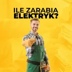 Uśmiechnięty elektryk w zielonym ogrodniczkach trzyma żarówki. Czy to znak, że czeka go dobrze płatna praca?