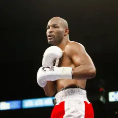 Bernard Hopkins training in the ring, focused and ready. His white gloves are a blur of motion as he prepares for his next fight.