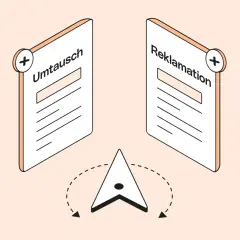 Zwei Karten mit "Umtausch" und "Reklamation" sowie ein Navigationspfeil symbolisieren das Umtauschrecht im Einzelhandel.