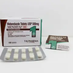 Opakowanie i blistry tabletek Mebendazol USP 500mg MENDITAJ, leku na infekcje pasożytnicze.