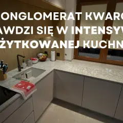 Nowoczesna kuchnia z blatem z kwarcogranitu, idealnym do intensywnego użytkowania.