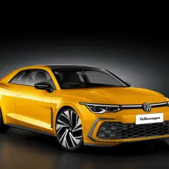 Żółty Volkswagen Corrado z czarnym dachem i felgami, prezentujący sportowy design.