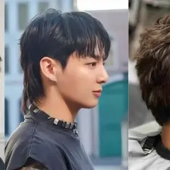 Tres hombres con estilos de cabello modernos. El del medio luce un corte mullet hombre con cabello oscuro y flequillo.