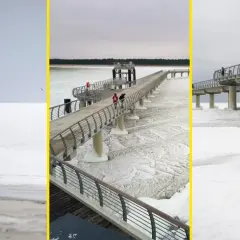 Spacerem po zamarzniętym morzu. Widok na molo i ludzi spacerujących po lodzie, pokazujący, jak zamarza morze.