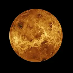Pomarańczowa Wenus, planeta bez księżyców, w kosmicznej czerni.