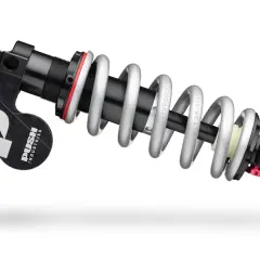 A PUSH Industries 11-6 rear shock absorber with a silver coil spring and black body, ready to tackle any trail.