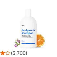 Biała butelka szamponu Healpsorin z pomarańczą i kwiatami. Produkt kontroluje objawy łuszczycy i łupieżu.