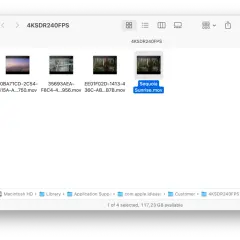 Widok folderu z plikami wideo, w tym "Sequoia Sunrise.mov". Możesz tu znaleźć inspirację, jak zmienić tapetę na laptopie.