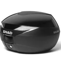 Baúl SHAD SH39 negro brillante, con logo plateado y detalles reflectantes. Ideal para llevar tus pertenencias en moto.