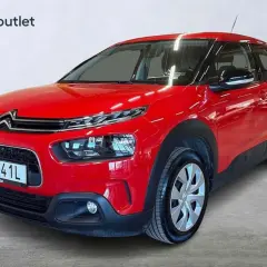 Röd Citroën C4, perfekt för en begagnad bil-test. Denna bil från Bilia Outlet ser ut att vara i toppskick.