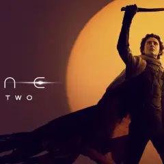 Dune 2 stream: Paul Atreides hebt ein Messer, Chani steht daneben. Epische Sci-Fi-Action erwartet dich!