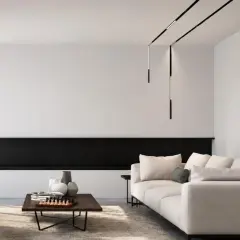 Nowoczesne oświetlenie do salonu aranżacje: minimalistyczny salon z beżową sofą, czarną półką i designerskimi lampami wiszącymi.
