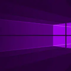Fond d'écran gaming violet abstrait, évoquant le logo Windows avec des jeux de lumière.