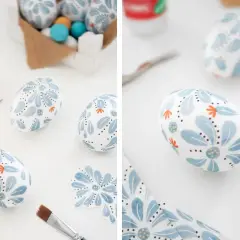 Lavoretti uova di polistirolo decorate con fiori azzurri e arancioni, pronte per Pasqua.