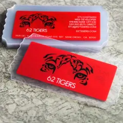 Bold red business cards with tiger eye graphics and "62 Tigers" text. Great business cards ideas for a fierce brand.