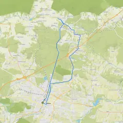 Mapa z zaznaczonymi ścieżkami rowerowymi w okolicach Kielc, prowadzącymi przez tereny zielone i miejscowości.