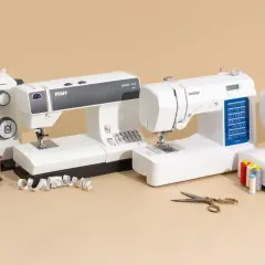 Four sewing machines are lined up, ready for beginners to learn how to use a sewing machine. Spools of thread, scissors, and fabric are nearby.