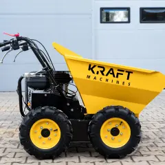 Żółty wozidło taczka spalinowa Kraft Machines z czarnymi kołami i silnikiem, gotowe do pracy na budowie.