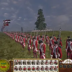 Żołnierze w czerwonych mundurach maszerują w formacji w grze Empire Total War. Flagi powiewają na wietrze.