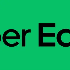 Zielony ekran z czarnym napisem "Uber Eats". Idealny na voucher Uber Eats dla miłośników jedzenia.