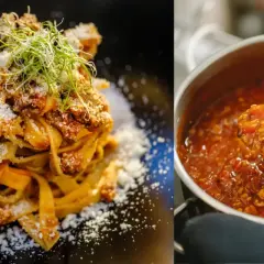 En tallrik med krämig pasta bolognese toppad med riven ost och en kastrull med den rika köttfärssåsen.