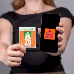 Elektroniczna winieta na szwajcarskie drogi płatne i jej cyfrowy odpowiednik na ekranie smartfona.