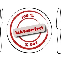 Talerz z napisem "laktose-frei" i symbolami 100%. To oznacza, że produkt nie zawiera laktozy, czyli cukru mlecznego.