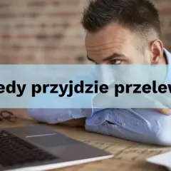 Zestresowany mężczyzna czeka na przelewy wychodzące z Santander.