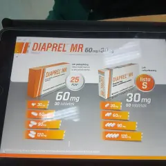 Na ekranie tabletu widoczna jest reklama leku DIAPREL MR z gliklazydem, prezentująca różne dawki i opakowania.