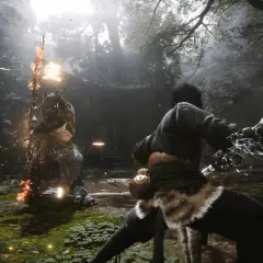 Wukong im Kampf gegen einen feurigen Gegner im Wald. Ein epischer Moment aus Black Myth: Wukong.